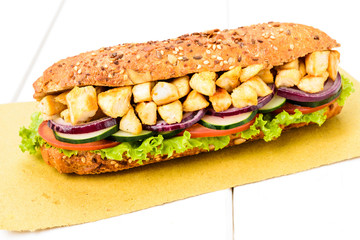 Hot sandwich with chicken and vegetables