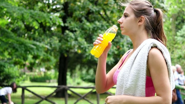 Woman drinking an energy drink