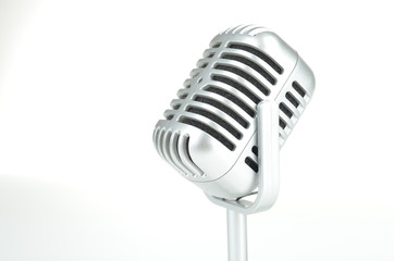 Vintage silver microphone on white background