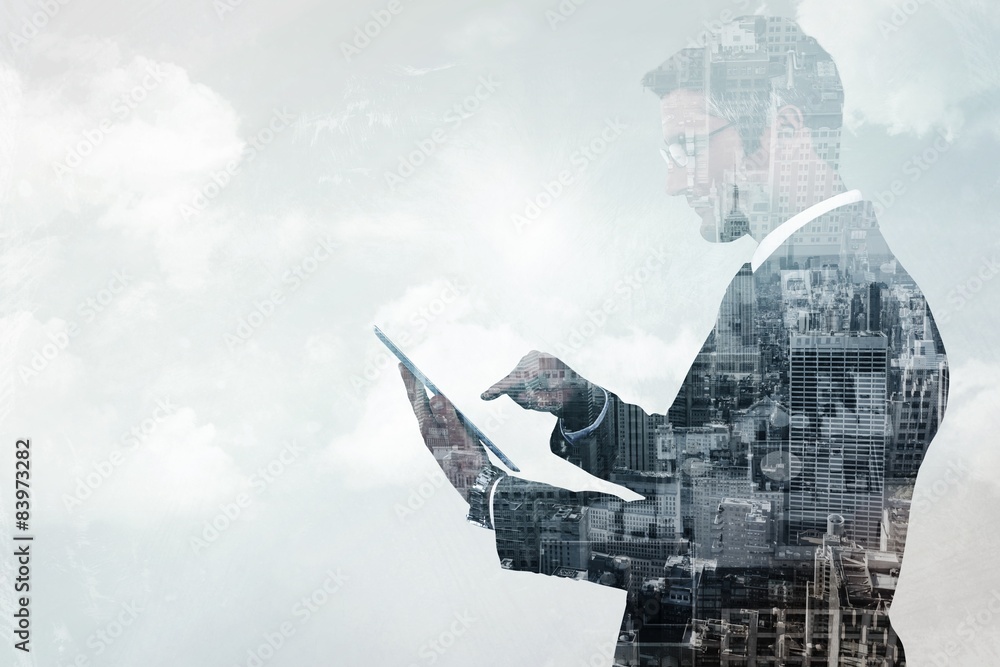 Poster composite image of mid section of a businessman touching tablet