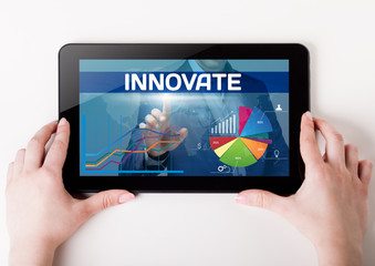 Girl holding a tablet pc which a man presses the virtual screen