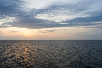 Fototapeta na wymiar Sunrise from the sea at Ao Thai, Thailand