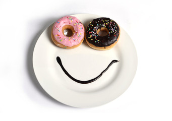 smiley happy face on dish donuts eyes  chocolate smile