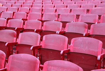 Naklejka premium red chairs in the stadium before the show