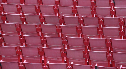 Fototapeta premium red empty chairs in the stadium