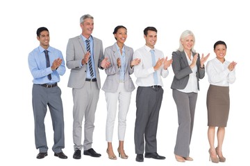 Obraz premium Business people holding cup and cheering 