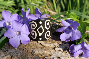 Handmade bone black ring on the nature background