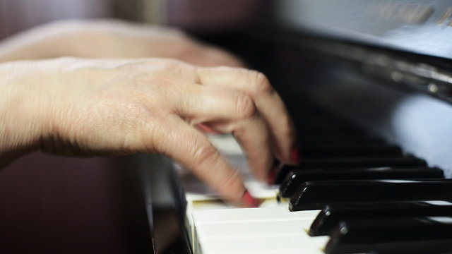 Woman playing the piano.