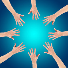Group of eight hands at the circle together teamwork showing you