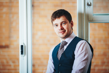 Fototapeta premium Handsome Caucasian Man Staying In Room