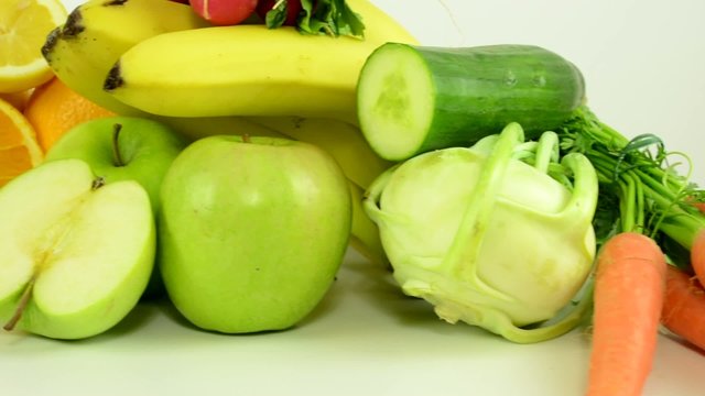 healthy food - vegetables and fruits - white background studio - closeup
