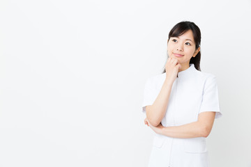 portrait of asian nurse on white background