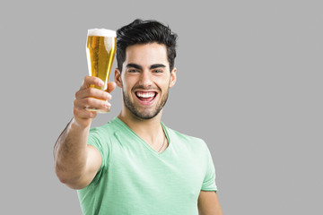 Young man drinking beer