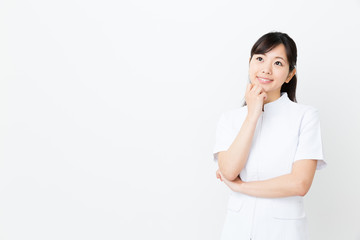 portrait of asian nurse on white background