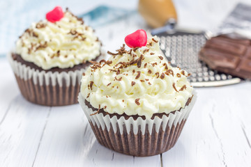 Chocolate cupcakes with ricotta cheese frosting