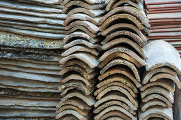 stack of old french roof tiles