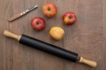 American apple pie preparation in rustic