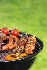 Barbecue grill with various kinds of meat