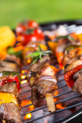 Delicious skewers on grill