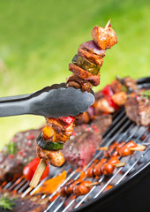 Delicious skewers on grill