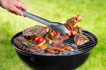 Barbecue grill with various kinds of meat