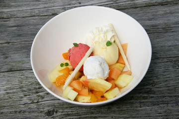 Different flavours of ice cream in a bowl.