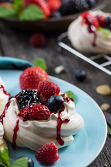 Homemade pavlova meringue with fresh berries