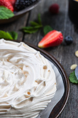 Homemade pavlova meringue with summer fresh berries