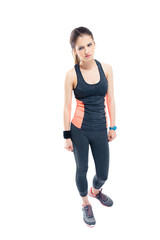 Full length portrait of a pensive sporty woman
