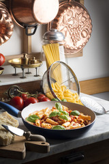 Pan with macaroni on the kitchen table