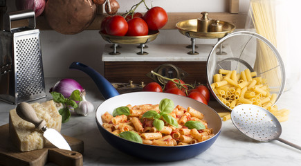Pan with macaroni on the kitchen table