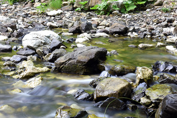 water flowing picturesquely on the rocks