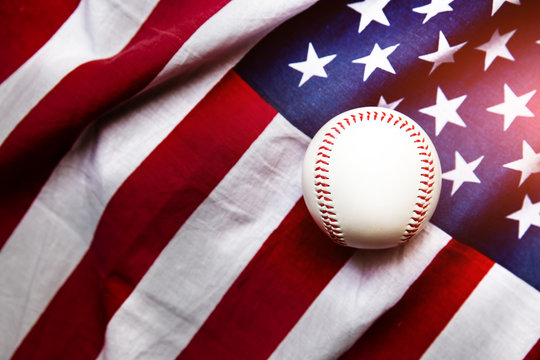 baseball with American flag in the background