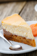 Sweet slice of carrot cake on white plate.