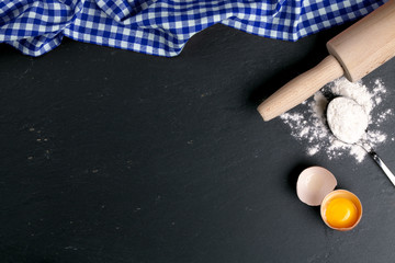 bakery baking cooking background with ingredients and checkered tablecloth