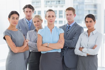 Business team smiling at camera