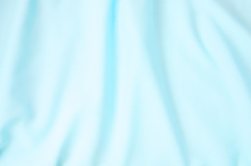Crumpled bluefabric texture background