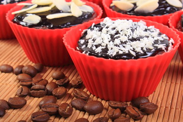 Chocolate muffins with desiccated coconut and almonds, 