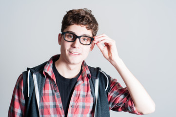 handsome teenager wearing glasses