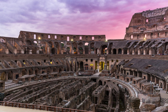 Internal view of the famous Coliseum at dusk Rome, Italy. 
