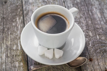 coffee cup black wooden board brown white