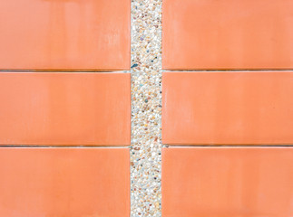 Scree wall with red plate