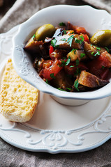 Traditional sicilian dish caponata with eggplant and tomato