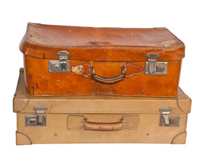 Two vintage suitcases, white background