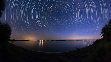 Star trails at the lake side