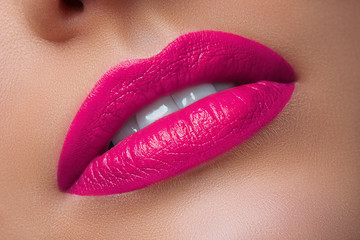 Close-up of Woman's Lips with Bright Fashion Pink Lips