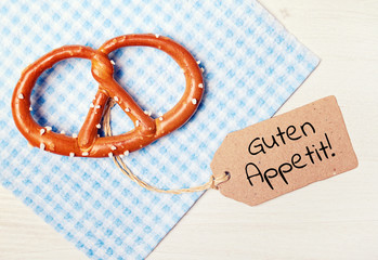 food background - pretzel on wood table - enjoy your meal - 84004835