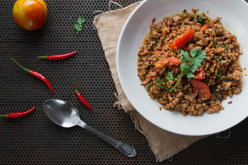 fried pork with basil leaves