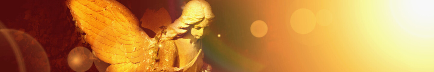Fototapeta golden angel in the sunlight (antique statue) obraz