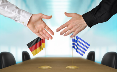 Germany and Greece diplomats agreeing on a deal